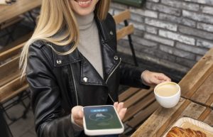 woman making a cashless payment